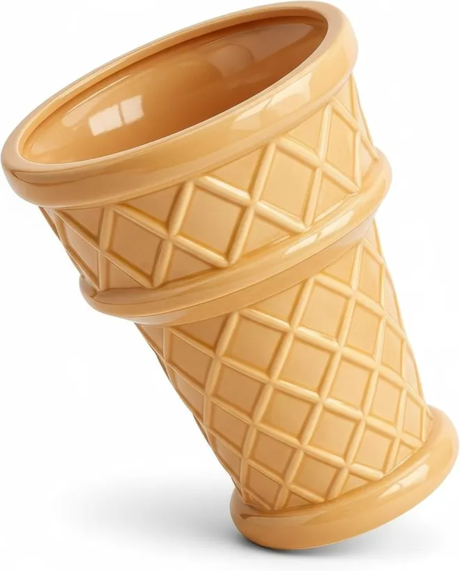 The seller's own photo of a ceramic ice cream cone planter on white