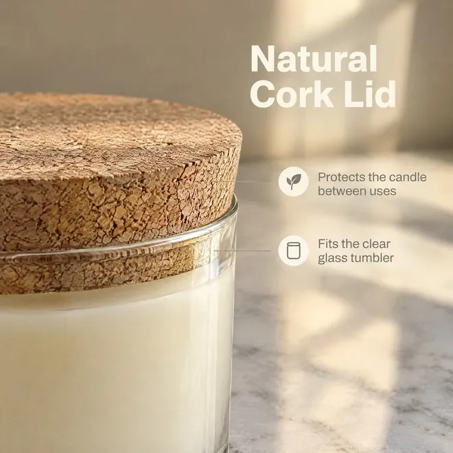 Close-up of the cork lid on the jar, "Natural Cork Lid: protects the candle between uses, fits the clear glass tumbler"