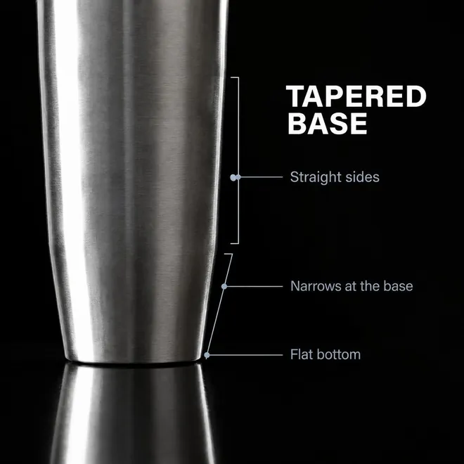 The tumbler's side and base on black, "Tapered Base: straight sides, narrows at the base, flat bottom"